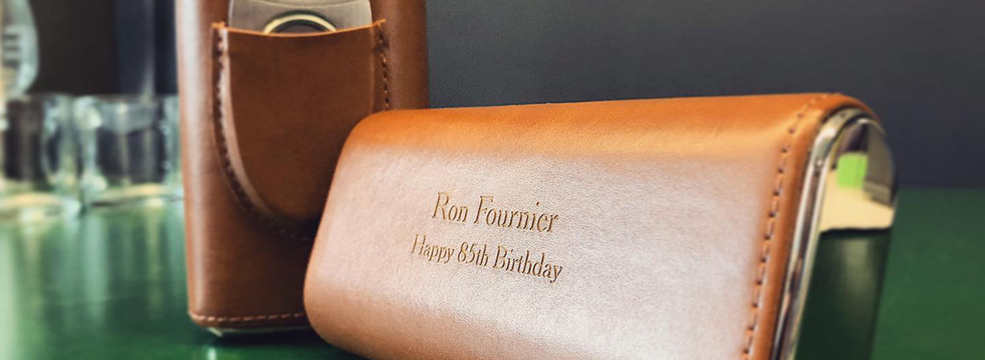 a leather wrapped cigar humidor personalized with laser engraving